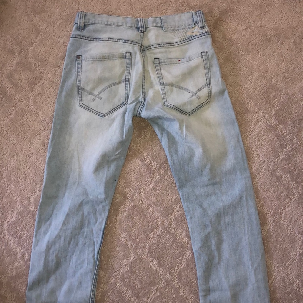 Light wash billabong mid-rise jeans.